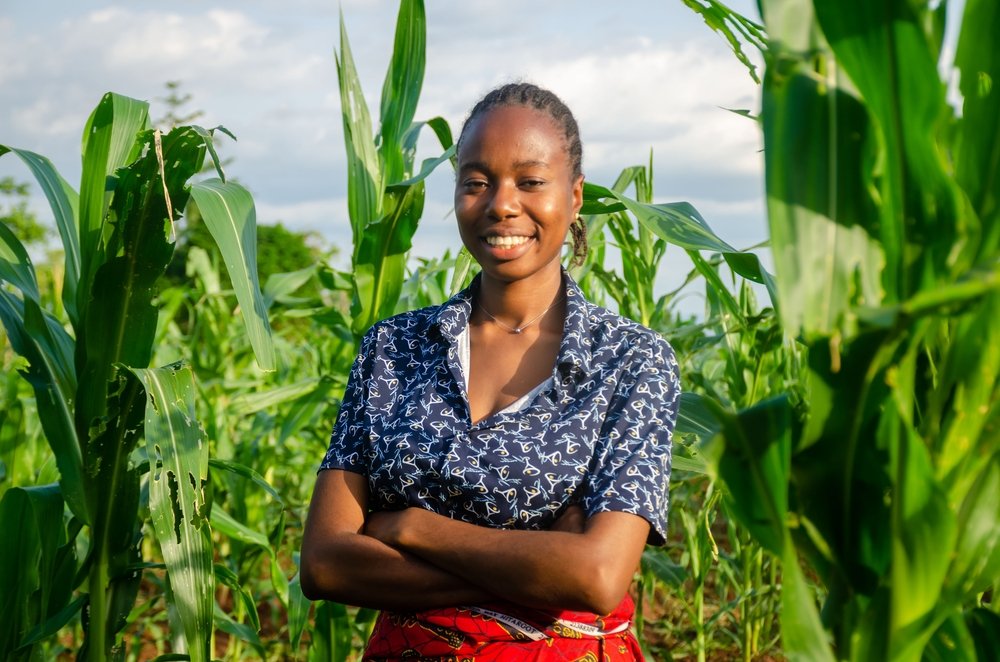 Portrait,Of,An,Excited,And,Happy,Female,African,Farmer